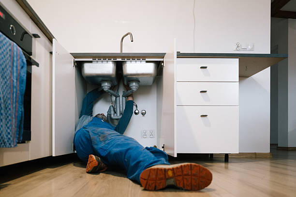 Professional Drain Cleaning technician working in Saint Louis, MO